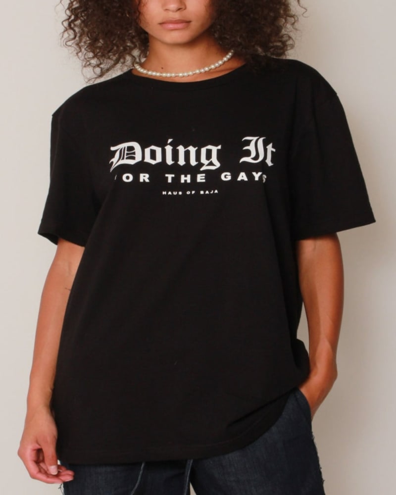 Front of a model wearing a size 3 "Doing It For The Gays" Tee in Black by BAST EAST. | dia_product_style_image_id:275141
